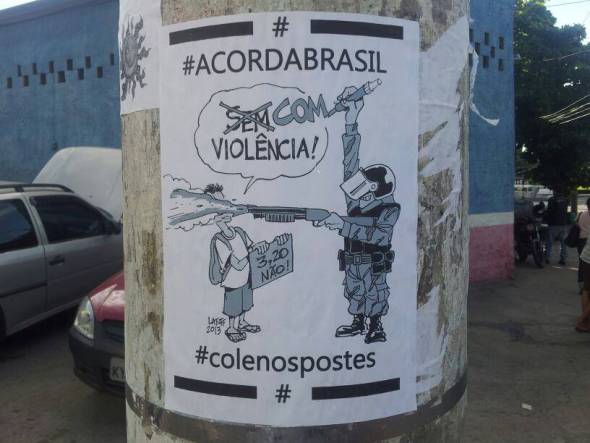 A charge do Latuff virou cartaz de rua em Sampa